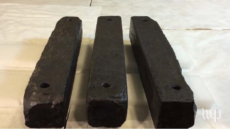 Some of the iron ballast bars that were shipped to the U.S. to be displayed at the Smithsonian Museum of African American History